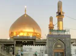 صورة لقبة ومآذن مقام العسكريين عليهما السلام عند غروب الشمس